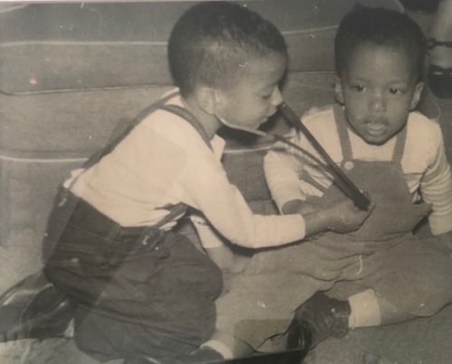 Young Dr. Wesley, age 4, examining his brother Ron, age 3